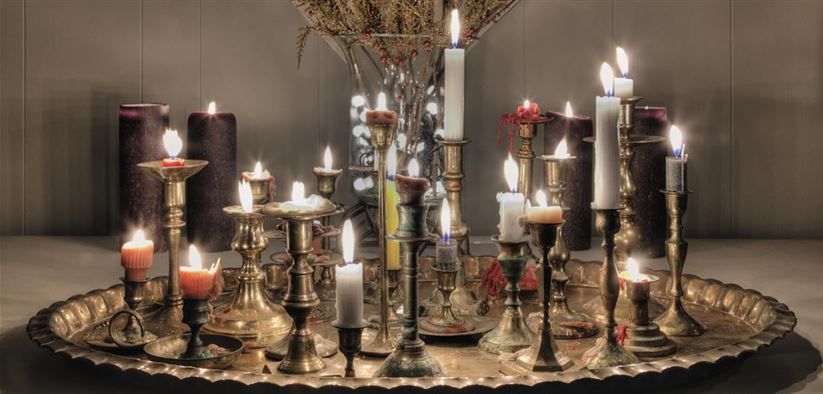 54599-candles-burning-on-metal-platter-RDJA4VD.jpg